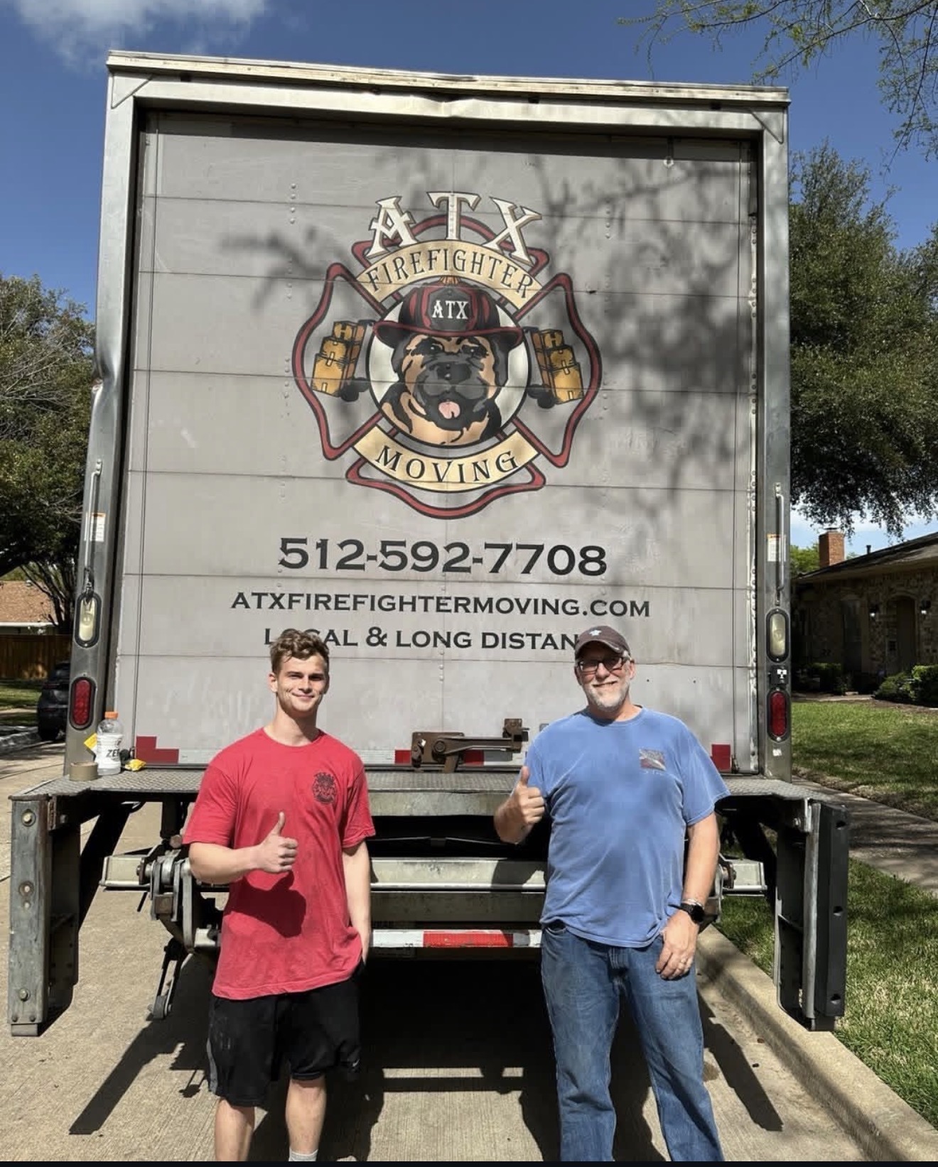 ATX Firefighter Moving crew beside branded moving truck in Austin, Texas