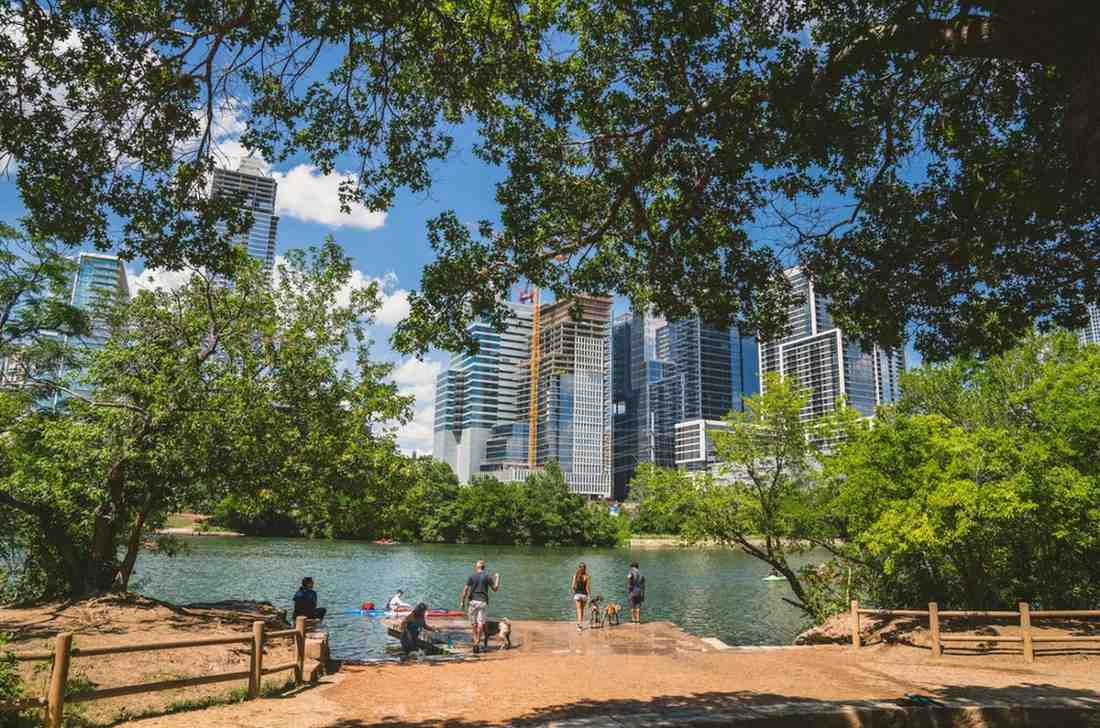 Outdoor park and waterfront in Austin TX with city skyline